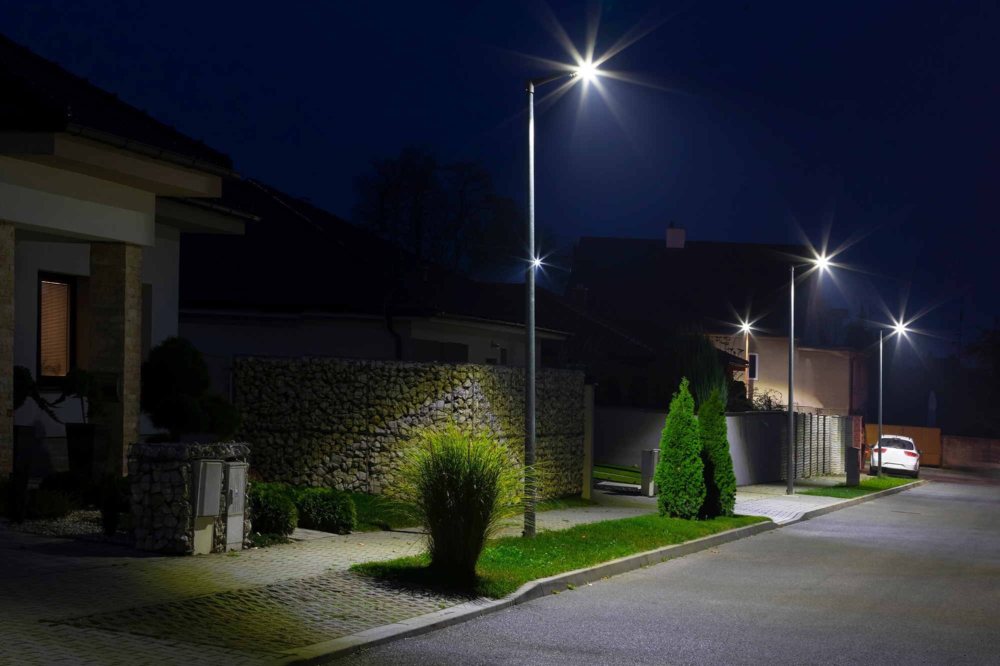 street in a residential area with modern streetlights